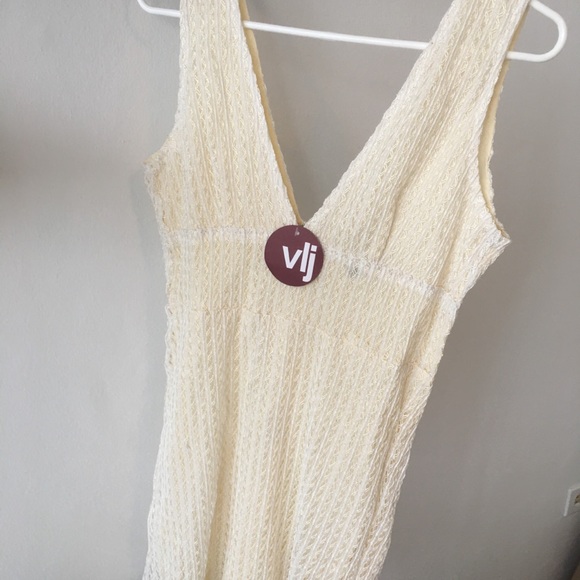 Never worn short dress, runs likes a medium. - Picture 1 of 1